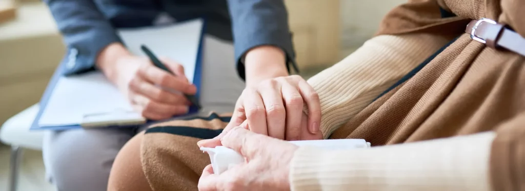 psychologist-consulting-senior-woman-nursing-home