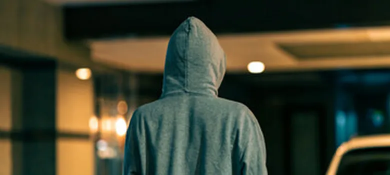 person with his back to the hood